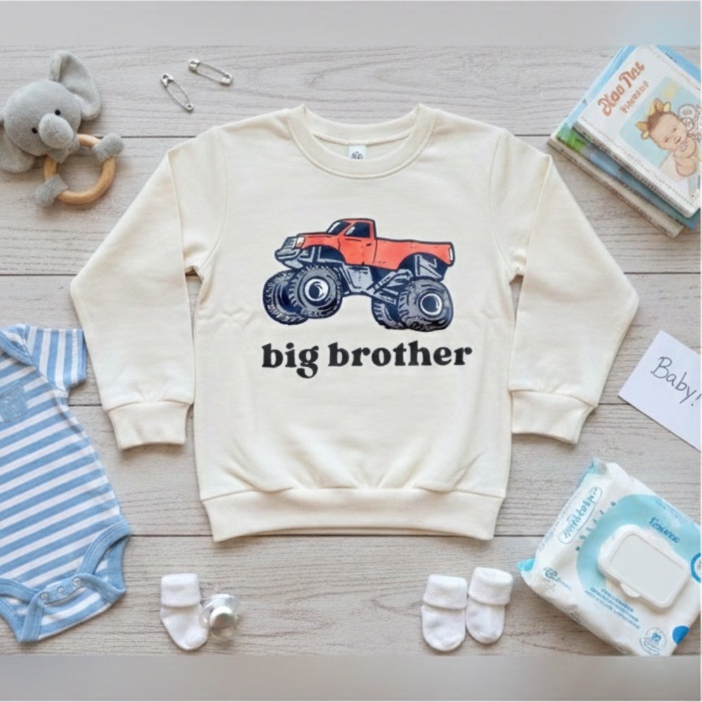 Big Brother Cream Sweatshirt with Orange Monster Truck Graphic